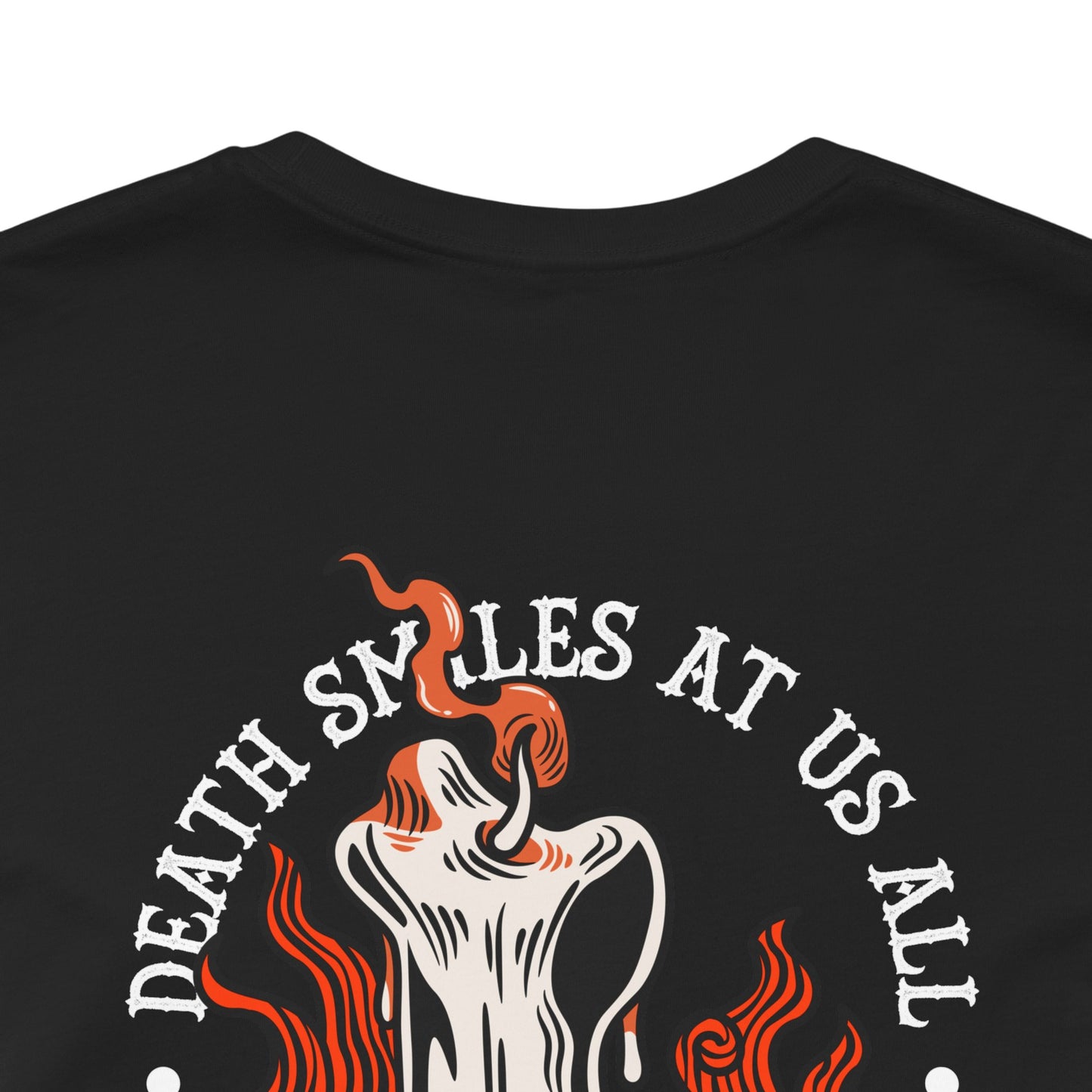 Black t-shirt with graphic design and text 'DEATH SMILES AT US ALL' on a white background