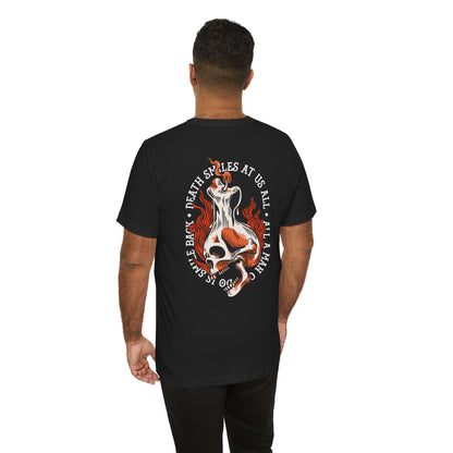 Person wearing a black t-shirt with a graphic design on the back, standing against a white background.