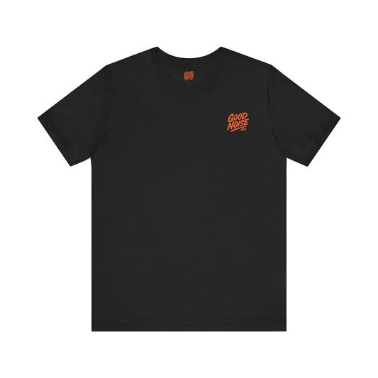 Black t-shirt with orange text on a white background