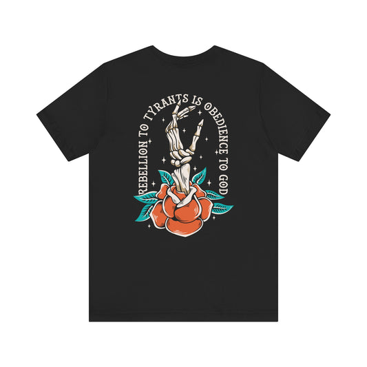 Black t-shirt with a graphic design featuring a skeleton hand holding a rose and text on a white background