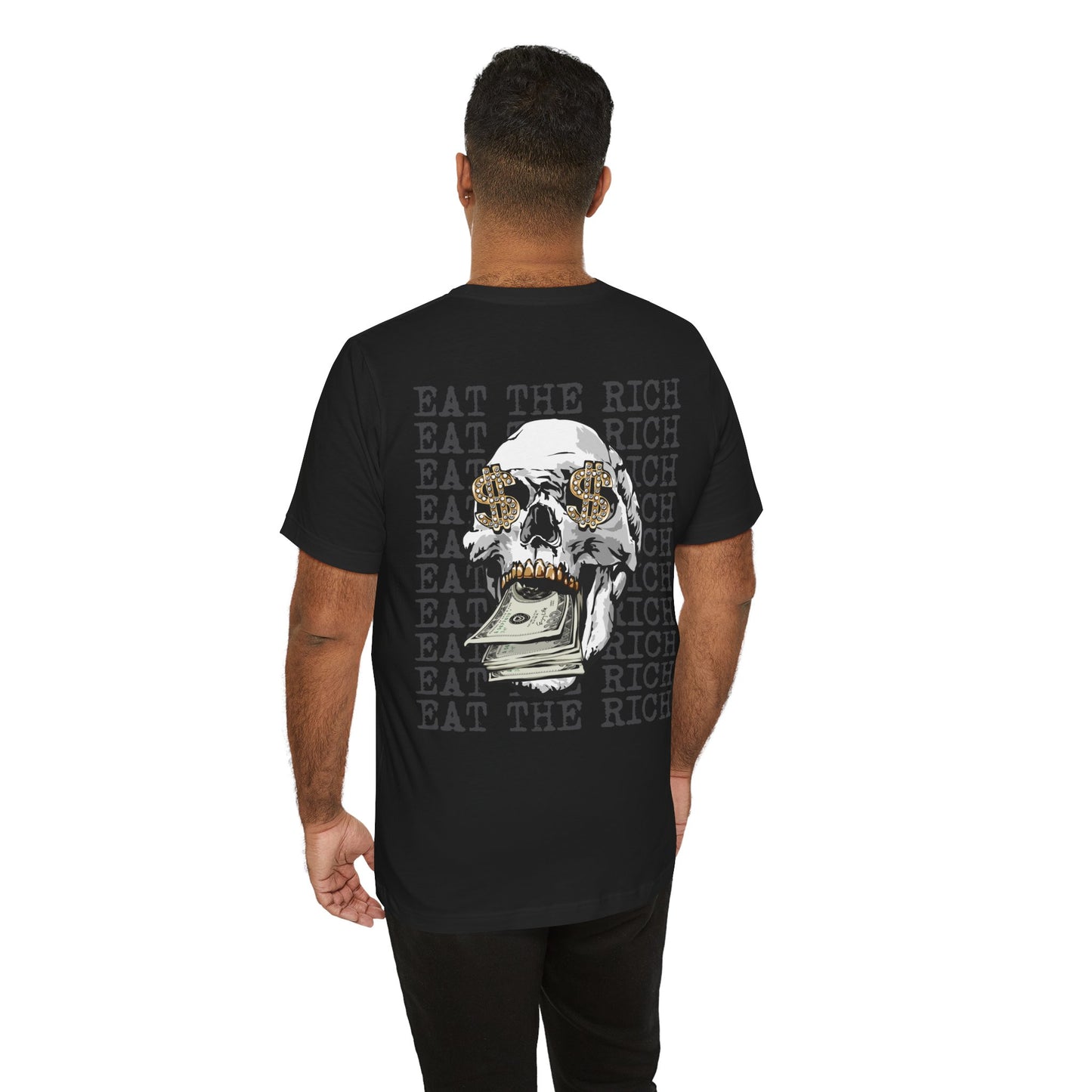 Man wearing a black t-shirt with a skull and dollar bill graphic on the back, with 'Eat the Rich' text.
